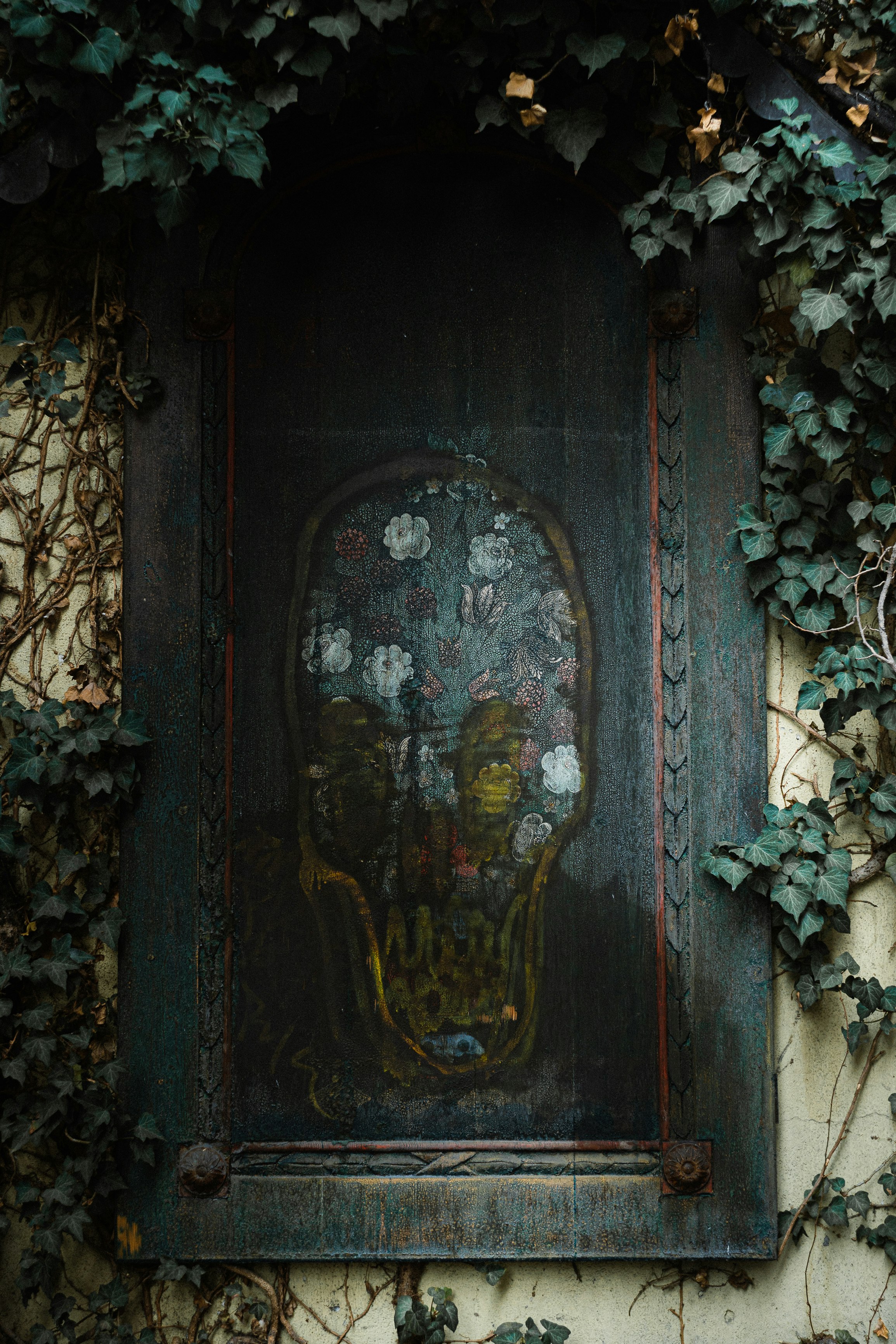 blue wooden door with gold and black door lever